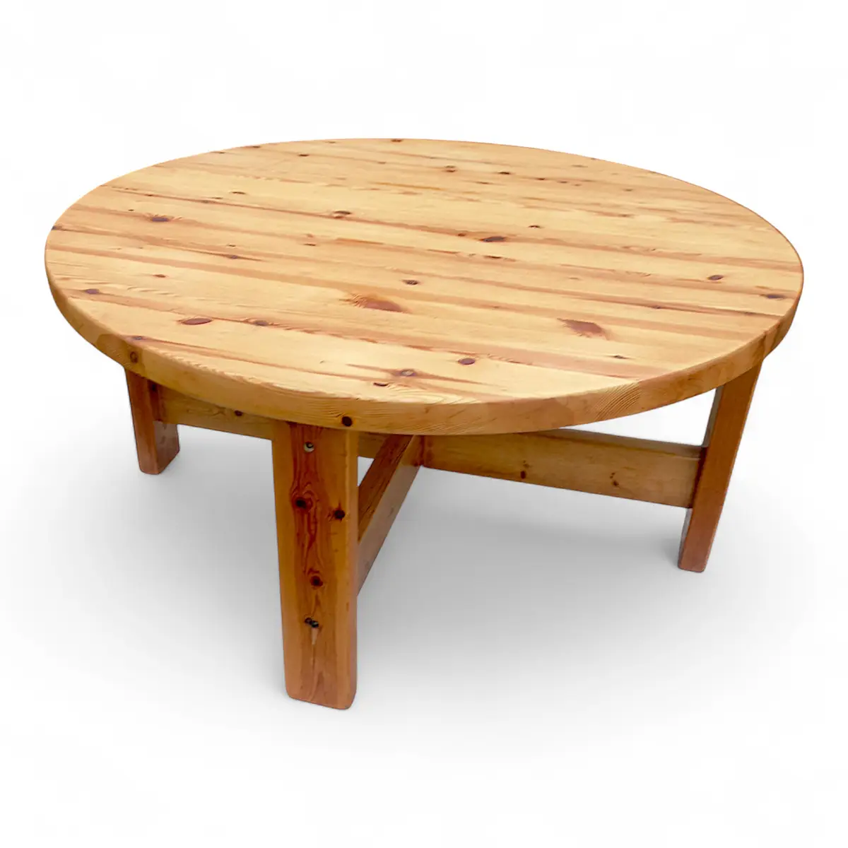 Rundt sofabord i massivt olieret fyrretræ med krydssprosse, dansk design fra 1970’erne.